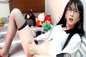 Skinny tranny playing asian cock...