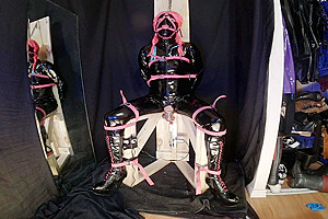 Strapped To Chair In Pvc Catsuit Gagged In Chastity...